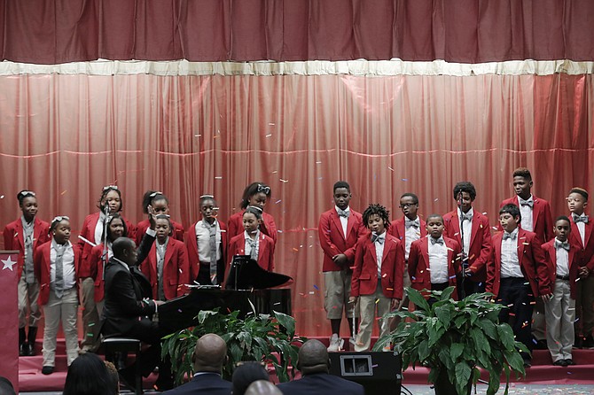 The Baker Bulldogs choir sings to welcome guests to their school.