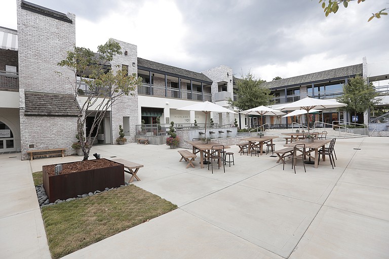 Highland Village will modernize the look of the Promenade storefront facing Whole Foods in preparation for Kendra Scott, removing the building's exterior overhang above the entrance to Buffalo Peak Outfitters.