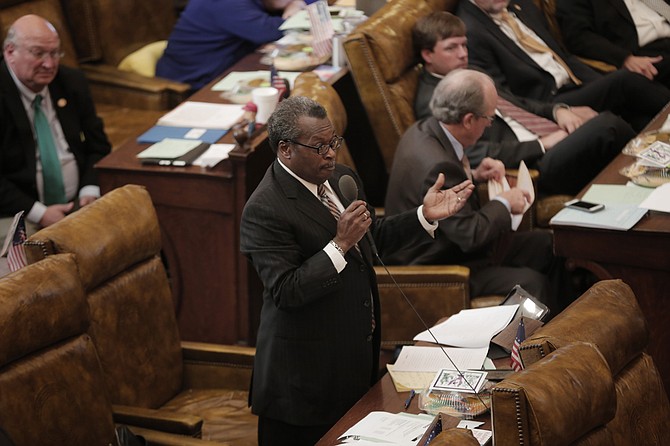 Rep. Willie Perkins, D-Greenwood, (with microphone) pressed Rep. Jason White, R-West, on why certain things in House Speaker Philip Gunn’s campaign-finance reform bill were not defined clearly in debate on Jan. 11; 
the bill passed the House that day after an hour-long debate.