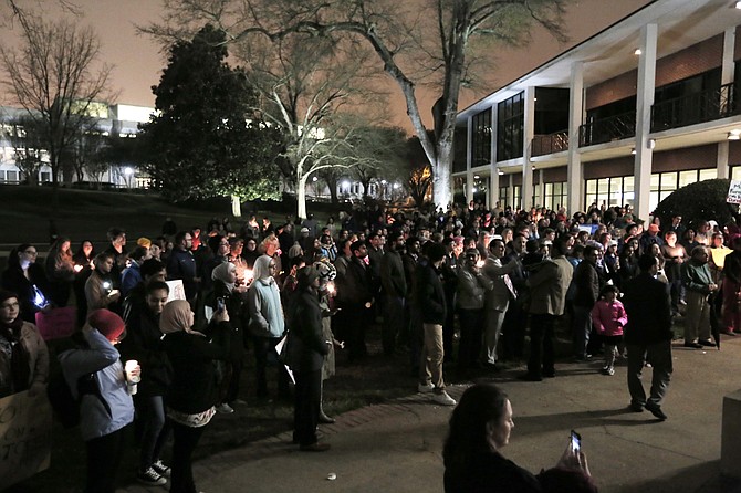 Over a hundred Mississippians gathered at Millsaps College for a peaceful vigil in support of Muslims, immigrants and refugees potentially affected by executive orders President Donald Trump signed last week.
