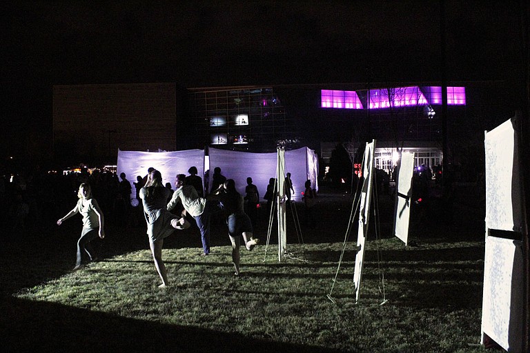 Dancers from Kinetic Etchings do a light dance at the Mississippi Light Festival on Feb. 24, 2017.