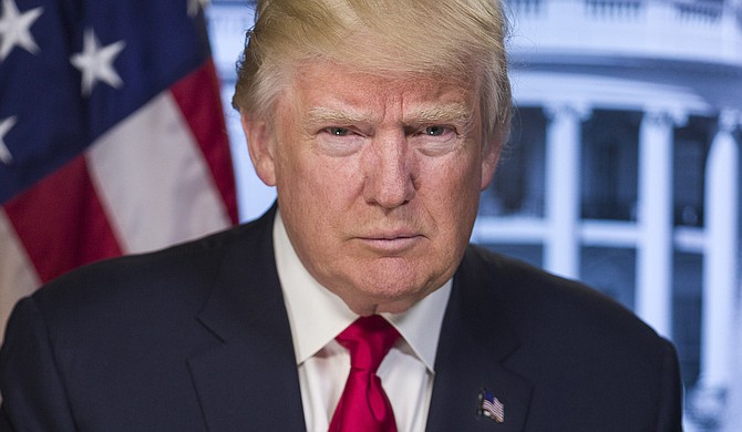 President Donald Trump earned $153 million and paid $36.5 million in income taxes in 2005, paying a roughly 25 percent effective tax rate thanks to a tax he has since sought to eliminate, according to newly disclosed tax documents. Photo courtesy Whitehouse.gov