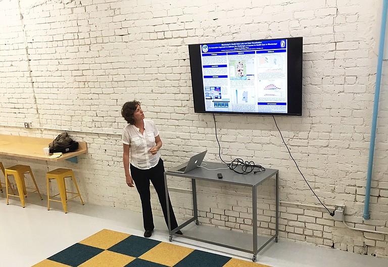 Denise Krause speaks at 1 Million Cups Jackson on March 22 about her business, Health Data Analytics, which aggregates Mississippi's health data.