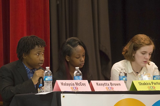 Kenytta Brown of Lanier High School (left),  Shakira Porter of Wingfield High School (middle) and Maggie Jefferis of Murrah High School (right) questioned mayoral candidates at Provine High School on Monday night as part of the Youth Media Project student media panel. Not pictured: Dartavius Archie.