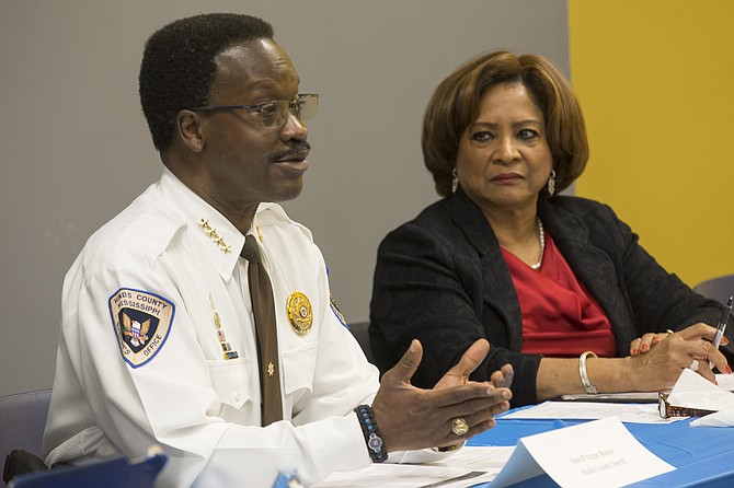 Hinds County Sheriff Victor Mason (left) and Supervisor Peggy Calhoun (right) discuss the importance of mental-health services and diversion programs for Hinds County residents entering the criminal-justice system.