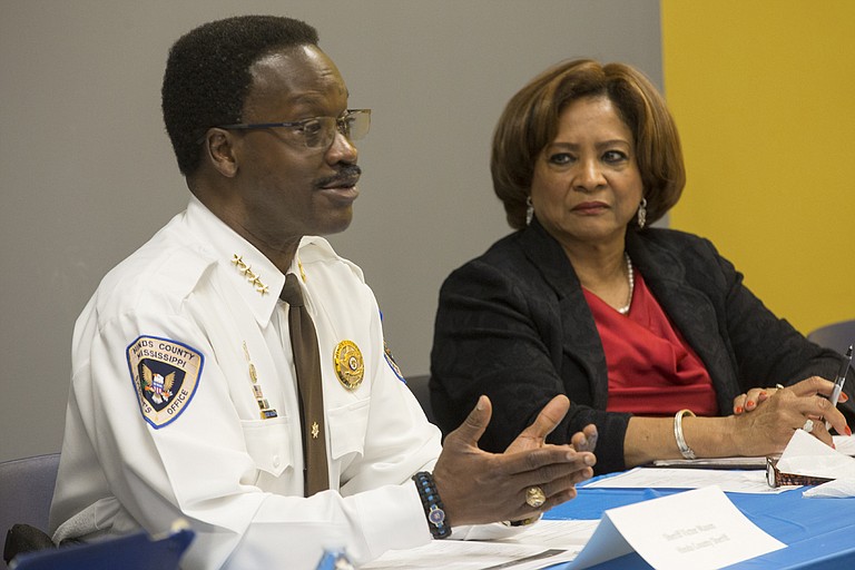 Hinds County Sheriff Victor Mason (left) and Supervisor Peggy Calhoun (right) discuss the importance of mental-health services and diversion programs for Hinds County residents entering the criminal-justice system.