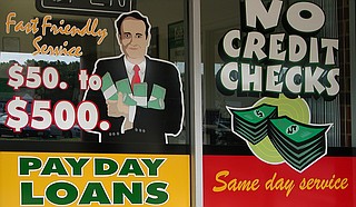A judge is blocking a state order that would close one of Mississippi's largest payday lenders. Photo courtesy Flickr/Taberandrew