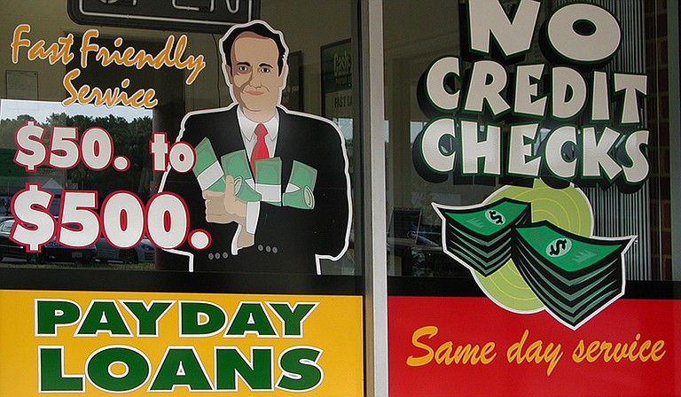 A judge is blocking a state order that would close one of Mississippi's largest payday lenders. Photo courtesy Flickr/Taberandrew