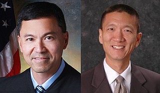In March, U.S. District Judge Derrick Watson (left) in Honolulu blocked the new version of Trump's travel ban from taking effect, citing what he called "significant and unrebutted evidence of religious animus" in Trump's campaign statements. Hawaii Attorney General Douglas Chin (right) wrote to the 9th Circuit that "the President claims a nearly limitless power to make immigration policy that is all but immune from judicial review" and "he must be checked." Photo courtesy US Courts State of Hawaii