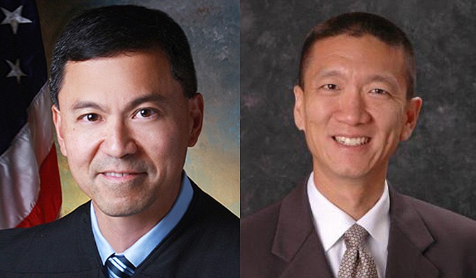 In March, U.S. District Judge Derrick Watson (left) in Honolulu blocked the new version of Trump's travel ban from taking effect, citing what he called "significant and unrebutted evidence of religious animus" in Trump's campaign statements. Hawaii Attorney General Douglas Chin (right) wrote to the 9th Circuit that "the President claims a nearly limitless power to make immigration policy that is all but immune from judicial review" and "he must be checked." Photo courtesy US Courts State of Hawaii