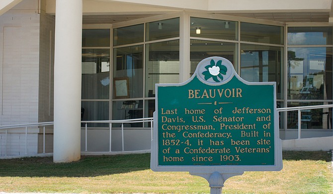 A sign designating the last home of Jefferson Davis sits outside Beauvoir in Biloxi, Miss.