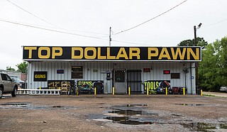 Top Dollar Pawn Shop published on its Facebook account that it is “permanently closed,” but it was still open for business at press time.