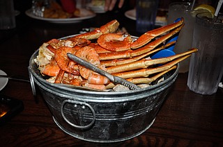 A crab and shrimp boil is an easy way to feed a large group of people without overspending. Photo courtesy Flickr/Chrisgent