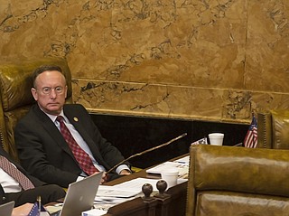 Rep. Karl Oliver sat poker-faced as black lawmakers talked about more than 600 lynchings that took place in Mississippi from 1877 to 1950.