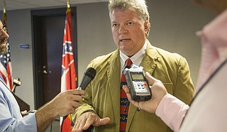 Attorney General Jim Hood said Thursday that he will ask the Mississippi Supreme Court to approve execution dates for two inmates, even though court challenges are still pending to the state's lethal injection methods.