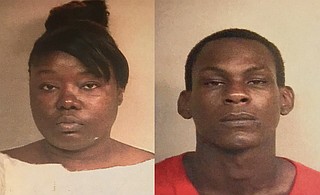 Police charged Lakia Bradley (left) and Kendrick Jackson (right) with three counts of aggravated assault and shooting into an occupied vehicle after a bullet struck a sleeping 9-year-old in the car. Photo courtesy JPD