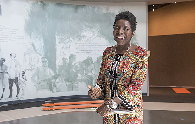 Civil Rights Museum Director Pamela Junior stands in Gallery 3, the "Reflections" room of the state's new Civil Rights Museum on June 27. It and the Museum of Mississippi History opens Dec.9.