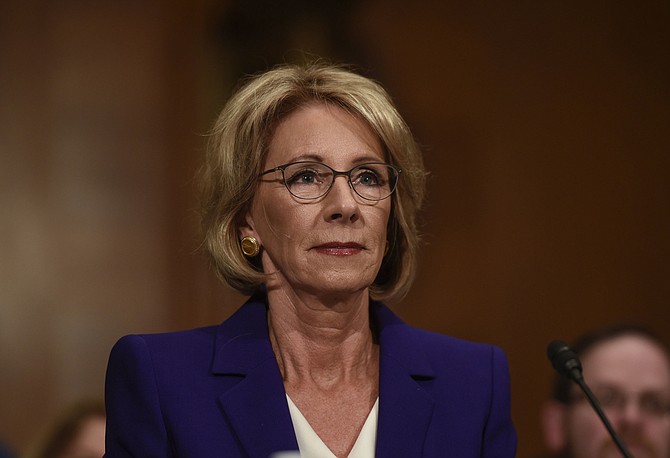 The apology by Candice Jackson, acting assistant secretary for civil rights, came amid a series of meetings that her boss, Education Secretary Betsy DeVos (pictured), is holding to examine the impact of President Barack Obama's crackdown on campus sexual violence. Photo courtesy AP/Riccardo Savi