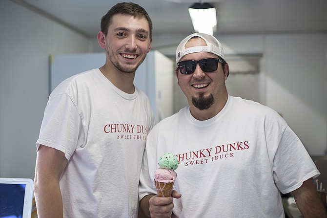 Chunky Dunks Sweets Truck owner Will Lamkin (right) says he likes to keep his business in the family. His nephew, Beau Nelson (left), helps out.