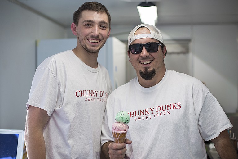 Chunky Dunks Sweets Truck owner Will Lamkin (right) says he likes to keep his business in the family. His nephew, Beau Nelson (left), helps out.