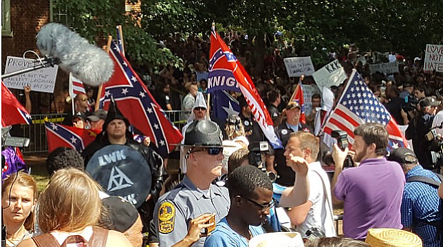 Charlottesville descended into violence Saturday after neo-Nazis, skinheads, Ku Klux Klan members and other white nationalists gathered to "take America back" and oppose plans to remove a Confederate statue in the Virginia college town, and hundreds of other people came to protest the rally. The groups clashed in street brawls, with hundreds of people throwing punches, hurling water bottles and beating each other with sticks and shields. Photo courtesy Flickr/getfree_360