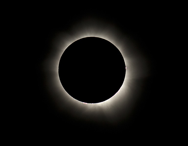 Millions of Americans gazed in wonder through telescopes, cameras and disposable protective glasses Monday as the moon blotted out the sun in the first full-blown solar eclipse to sweep the U.S. from coast to coast in nearly a century. Photo courtesy Flickr/Nicholas Jones