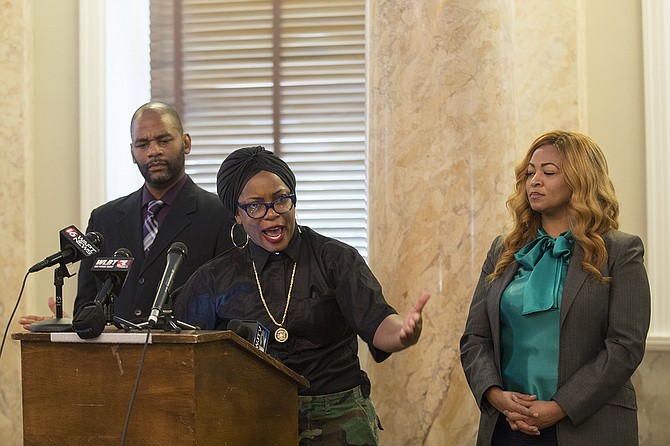 Actress and activist Aunjanue Ellis (center), with Ward 3 Councilman De'Keither Stamps (left) and Dr. Edelia Carthan (right), said at the Mississippi Capitol that it is "a civil right to not feel tormented and terrorized by symbols." Therefore, she insists, the Mississippi flag must change and with white support.