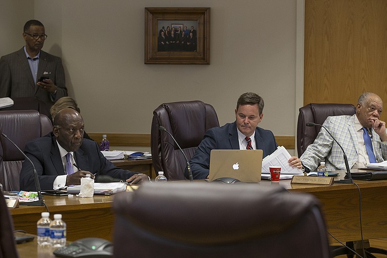 Mississippi Board of Education members John Kelly, Jason Dean and Charles McClelland (left to right) all had questions about changing the baseline for state test scores at the board’s meeting on Thursday, Aug. 17.