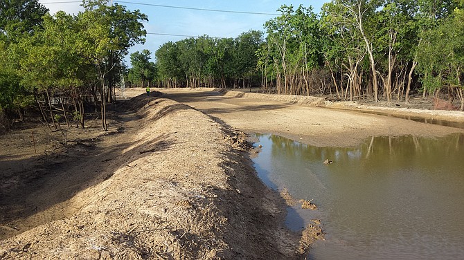 Because of big early 20th-century floods, Houston designed two dry emergency reservoirs that are only activated in heavy rain, Addicks (pictured) and Barker, both formed by earthen dams. Photo courtesy U.S. Army Corps of Engineers