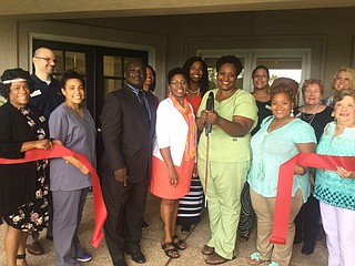 Tiffany Hathorn (center right), owner of Nail Envy Salon in the Regions Plaza building downtown, held a grand opening for her new business, Envy Life Nutrition Club on Aug. 17. Photo courtesy Tiffany Hathorn