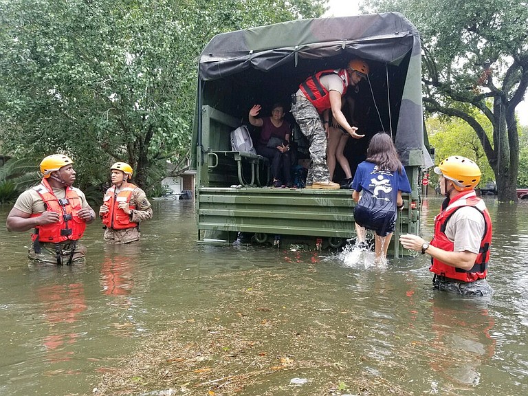Rescuers began a block-by-block search of tens of thousands of Houston homes Thursday, pounding on doors and shouting as they looked for anyone—alive or dead—who might have been left behind in Harvey's fetid floodwaters, which have now heavily damaged more than 37,000 homes and destroyed nearly 7,000 statewide. Photo courtesy Flickr/Lt. Zachary West