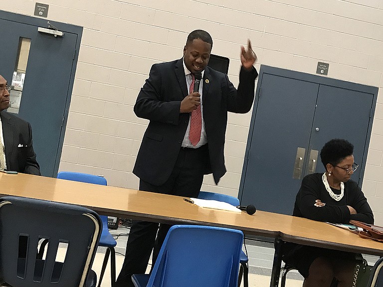 Ward 6 Councilman Aaron Banks hosted a townhall meeting about crime Thursday night at Forest Hill High School. In addition to the usual line-up of police officers at the front table, Banks focused on the need for residents, especially men, to praise and guide young people on their block.