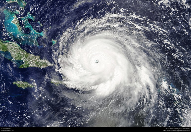 Hurricane rolled past the Dominican Republic and Haiti and battered the Turks and Caicos Islands early Friday with waves as high as 20 feet. Photo courtesy Flickr/Antti Lipponen