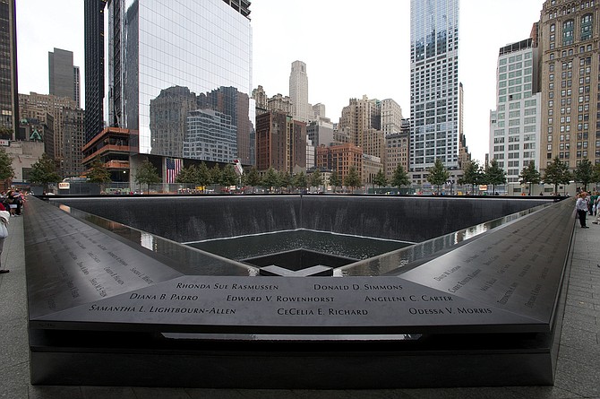 At least 1,000 family members, survivors, rescuers and officials were gathered for the ceremony at the National Sept. 11 Memorial plaza at the World Trade Center. Photo courtesy Flickr/Brian Kusler