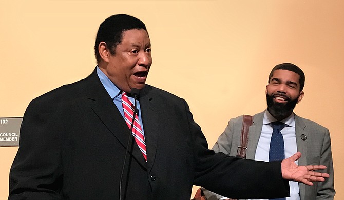 Ward 3 Councilman Kenneth Stokes (left) gathered people in City Hall to talk about solutions to youth crime. Mayor Chokwe A. Lumumba joined him briefly to emphasize that police cannot prevent most violence.