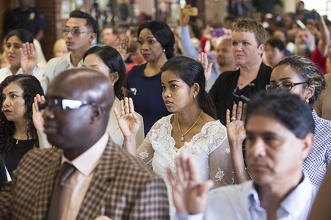Thirty-five new American citizens from 23 countries took the oath of citizenship in their naturalization ceremony hosted at Northwest Jackson IB Middle School Monday, Sept. 18.