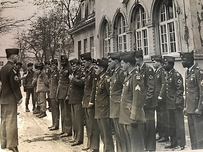 Donna Ladd's stepfather Willie Hoyt Smith (pictured front row, talking to commander) fought in the Korean War and later went to Vietnam twice during a 20-year military career. Like many southerners, the 1951 graduate of Dixon High School in Neshoba County lived and worked alongside racially diverse peers for the first time in the military. The location of this photo is unknown.