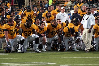 More than 200 players either knelt or used other means as expressions of unity last weekend. Lockhart said such actions are not a protest against the anthem or the flag. Photo courtesy Flickr/John Martinez Pavliga