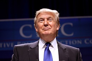 President Donald Trump delivered a foreboding message Thursday night, telling reporters as he posed for photos with his senior military leaders that this might be "the calm before the storm." Photo courtesy Flickr/Gage Skidmore