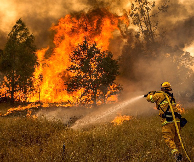 More than a dozen wildfires whipped by powerful winds swept through California wine country Monday, destroying at least 1,500 homes and businesses and sending an estimated 20,000 people on a headlong flight to safety through smoke and flames. Photo courtesy Bureau of Land Management California