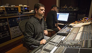 (Left to right) Malaco Music Group President Tommy Couch Jr. and Kent Bruce, chief engineer and head of production, behind the board at Malaco Studios in west Jackson.