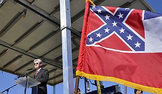Gov. Phil Bryant told the U.S. Supreme Court that Carlos Moore cannot show that the state flag discriminates in the same way that bans on same-six marriage did before declared unconstitutional. Trip Burns/File Photo