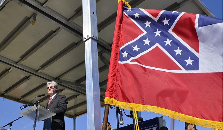 Gov. Phil Bryant told the U.S. Supreme Court that Carlos Moore cannot show that the state flag discriminates in the same way that bans on same-six marriage did before declared unconstitutional. Trip Burns/File Photo