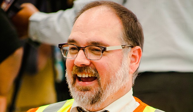 Scott Crawford, a disability advocate in Jackson, said it is a civil-rights violation for taxis to not provide equal services. He is pictured here at a press conference for JPD. Photo by Stephen WIlson