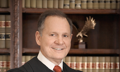 Roy Moore was removed as Alabama chief justice in 2003 when he disobeyed a court order to move a boulder-sized Ten Commandments monument out of the state Supreme Court building. After winning election to the post again, he was permanently suspended last year for urging state probate judges to refuse marriage licenses to gay couples, in defiance of the federal courts. Photo courtesy Judicial.alabama.gov