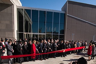 Myrlie Evers cut the red ribbon outside the Museum of Mississippi History and the Mississippi Civil Rights Museum that opened on Saturday. She also sat through remarks from President Trump at a private ceremony before the public opening.