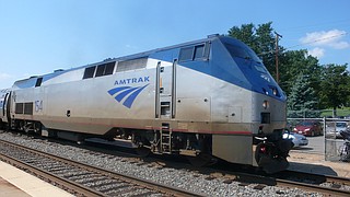 An Amtrak train making the first-ever run along a faster new route hurtled off an overpass Monday near Tacoma and spilled some of its cars onto the highway below, killing at least six people, authorities said. The death toll was expected to rise. Photo courtesy Flickr/Oliver