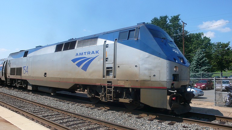 An Amtrak train making the first-ever run along a faster new route hurtled off an overpass Monday near Tacoma and spilled some of its cars onto the highway below, killing at least six people, authorities said. The death toll was expected to rise. Photo courtesy Flickr/Oliver