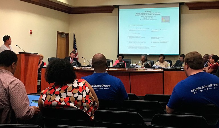 Jackson Public Schools Chief Financial Officer Sharolyn Miller addresses the Board of Trustees about forcing teachers and students to go to school Friday, Dec. 22, after the district closed two weeks ago for a snow day.