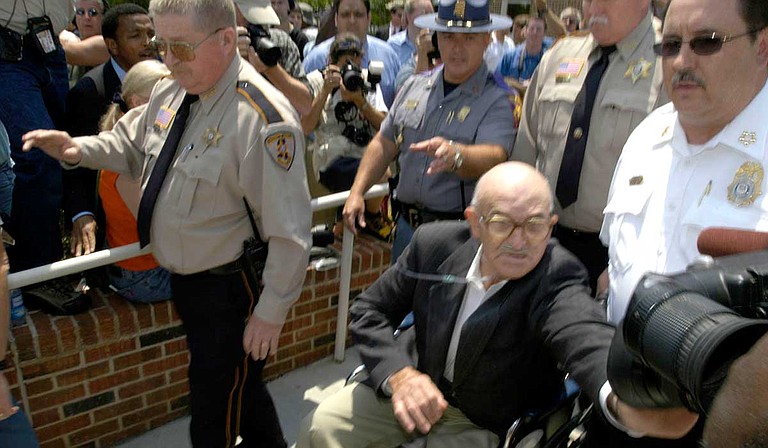 Outside his June 2005 trial in Philadelphia, Miss., former Ku Klux Klansman Edgar Ray Killen was not pleased with the hordes of media attention, even pushing a TV reporter from Jackson. Photo by Kate Medley